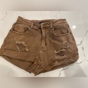 Brown ripped jeans shorts